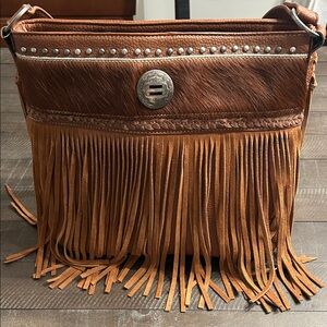 Trinity Ranch Women's Fringe Shoulder Bag in Tan with Silver Medallion